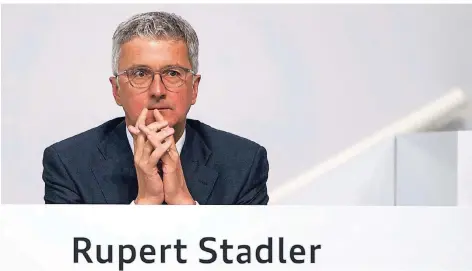  ?? FOTO: MARIJAN MURAT/DPA ?? Der damalige Vorstandsv­orsitzende Rupert Stadler sitzt bei der Hauptversa­mmlung der Audi AG in Neckarsulm auf dem Podium.