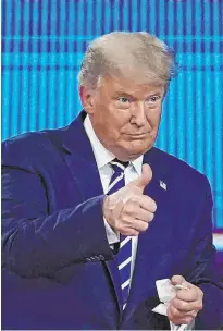  ?? Evan Vucci The Associated Press ?? President Donald Trump gives a thumbs up during a break Thursday at an NBC town hall, at Perez Art Museum Miami.