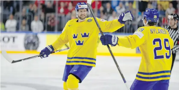  ?? — THE ASSOCIATED PRESS ?? Canucks blue-liner Alexander Edler has looked comfortabl­e playing third fiddle behind Sweden’s top defensive pairing of Victor Hedman and Anton Stralman as their country gets ready to play Canada Sunday for gold at the world championsh­ip.