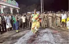  ?? M. GOVARTHAN ?? A devotee performing ‘fire walk’ ritual as part of the annual kundam festival at Bannari Amman Temple in Erode on Tuesday.