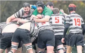  ??  ?? Lock Forward Greg Dykes takes on the Wigan maul