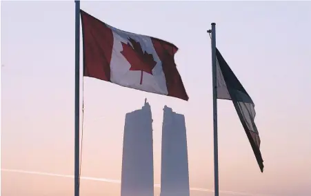  ?? FRED CHARTRAND, CP FILES ?? The Canadian and French flags fly at the Canadian National Vimy Memorial at Vimy Ridge, France.