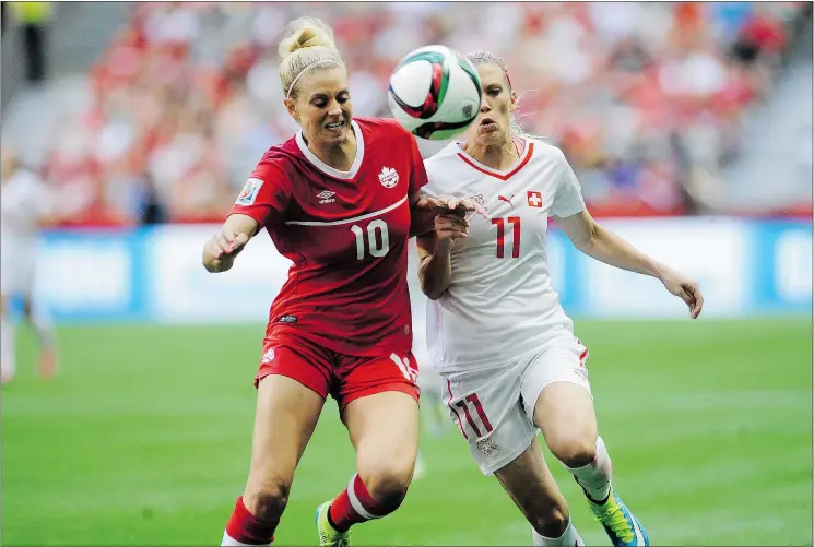  ?? MARK VAN ?? Canada’s Lauren Sesselmann battles hard against Switzerlan­d during FIFA Women’s World Cup 2015 action in B.C. Place stadium on Sunday. The Canadians won 1-0.