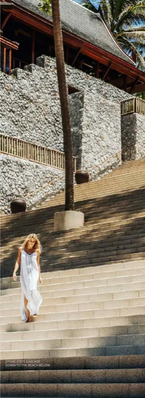  ??  ?? STONE STEPS CASCADE DOWN TO THE BEACH BELOW