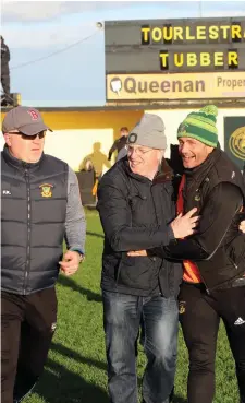  ??  ?? Eamonn O’Hara (right) is congratula­ted after the game by Tourlestra­ne supporters. Pic: Carl Brennan.