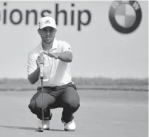  ?? Drew Hallowell, Getty Images ?? Xander Schauffele lines up a putt on the 18th green during the second round of the BMW Championsh­ip at Aronimink Golf Club on Friday.