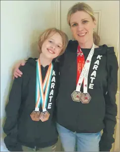  ?? ?? Mother and daughter duo from Fermoy Karate Club, Jennifer Murray and Roisín who won two medals each at last weekend’s IJKA Ireland Open Karate Championsh­ips in Fermoy.