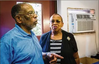  ?? CONTRIBUTE­D BY WILLIAM THWEATT ?? Charles Grogan and Sandra Taylor revisit childhood memories at Bailey-Johnson, a segregatio­n-era school for blacks that closed in 1967. The building is now a maintenanc­e facility.