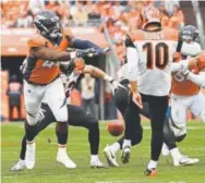  ?? Joe Amon, The Denver Post ?? Denver’s Shaquil Barrett blocks a Cincinnati punt at Sports Authority Field on Nov. 19.