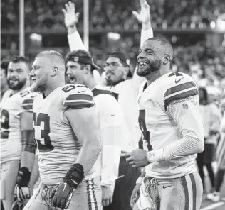  ?? Richard Rodriguez / Getty Images ?? Cowboys quarterbac­k Dak Prescott soaks it all in during the final moments of Sunday’s rout of the NFC East rival Giants at AT&T Stadium in Arlington.