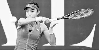  ??  ?? Han Xinyun of China plays a return against compatriot Wan Qiang during the 2017 ALYA WTA Malaysian Open women’s singles quarter-final at TPC Kuala Lumpur yesterday. Xinyun won 6-0, 7-6 (7-2). — Bernama photo
