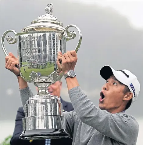  ?? Picture: AP. ?? The lid is about to come off the Wanamaker Trophy as Collin Morikawa celebrates his US PGA victory.