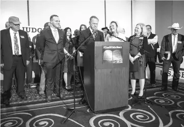  ??  ?? Moore speaks during a news conference with supporters and faith leaders in Birmingham, Alabama. — Reuters photo