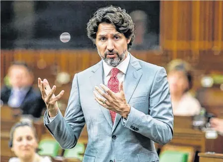  ?? BLAIR GABLE REUTERS ■ ?? Prime Minister Justin Trudeau speaks during a meeting of the special committee on the COVID-19 outbreak, as efforts continue to help slow the spread of the coronaviru­s disease (COVID-19), in the House of Commons on Parliament Hill in Ottawa on May 20.