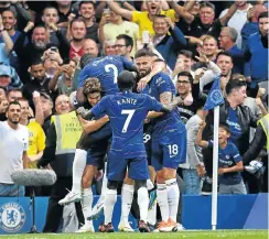  ?? Picture: Shaun Botterill/Getty Images ?? Marcos Alonso of Chelsea celebrates after scoring his team's third goal against Arsenal at Stamford Bridge in London yesterday.