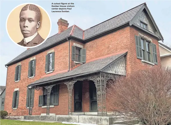  ?? STEVE STEPHENS PHOTOS/SPECIAL TO COLUMBUS DISPATCH ?? A cutout figure at the Dunbar House visitors center depicts Paul Laurence Dunbar.
The Dayton house where Paul Laurence Dunbar lived with his mother is now a museum and state memorial.