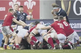  ?? ?? Ali Price and Jamie Ritchie show passion in the win over Wales last October