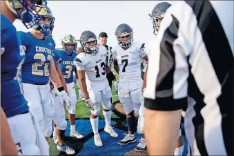  ?? [BRYAN TERRY/ THE OKLAHOMAN] ?? Shawnee sophomore Jaylon Orange (13) watches the coin toss before Friday's game at Choctaw.