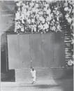  ??  ?? Running at top speed with his back to the plate, New York Giant centrefiel­der Willie Mays gets under a 450-foot blast off the bat of Cleveland first baseman Vic Wertz to pull the ball down in front of the bleachers wall in the eighth inning of the World Series opener at the Polo Grounds in New York in what may be the most famous catch in baseball history, 64 years ago today.