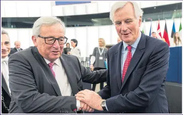  ?? Picture: EPA ?? HINDRANCE: Unhelpful EU bureaucrat­s Jean-Claude Juncker and Michel Barnier
