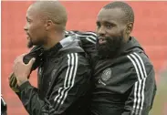  ?? Picture:SYDNEY MAHLANGU/BACKPAGE PIX ?? NEW TEAMMATES: Goodman Mosele and new signing Makhehleni Makhaula of Orlando Pirates during their team’s training session at the Rand Stadium on Wednesday