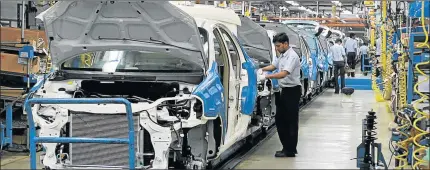  ?? Picture: REUTERS ?? ECONOMIC BLOW: General Motors is pulling out of South Africa and India, the company announced to staff at its plant in Port Elizabeth yesterday