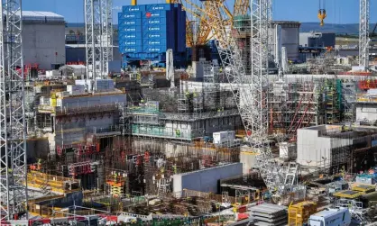  ??  ?? Constructi­on under way at Hinkley Point C nuclear power plant near Bridgwater, Somerset. The Chinese CGN holds a 33% stake, but there is no security risk as the plant is being built to the French firm EDF’s European design. Photograph: Ben Birchall/PA