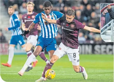  ??  ?? Kilmarnock’s Aaron Tshibola tries to win the ball from Olly Lee