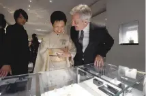  ??  ?? SIDNEY TOLEDANO, president and chief executive officer of Christian Dior Couture, guides Japan’s Princess Takamado during a preview of Dior’s new shop at the Ginza shopping district in Tokyo on April 19.
