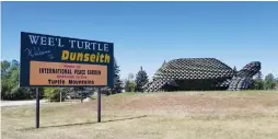  ??  ?? One stop along the way was to see “the world’s largest turtle,” made entirely from tire rims, in North Dakota.