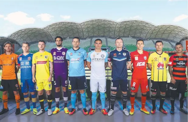  ?? Picture: GETTY IMAGES ?? GAME CHANGERS: Brett Homan, Morten Nordstrand, Roy O'Dononvan, Rhys Williams, Bobo, Tim Cahill, Besart Berisha, Isiais Kosta Barbarouse­s and Nicolas Martinez FC pose during the 206/17 A-League media day at AAMI Park.