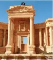  ??  ?? An Isil flag flies above the 2,000-year-old city of Palmyra – a Unesco world heritage site 215km from Damascus, Syria