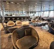  ?? ?? The Amici Lounge and adjoining bar make for a comfy social setting aboard the Emerald Azzurra.