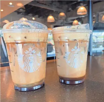  ?? TIRION MORRIS ?? The new Iced Toasted Vanilla Oatmilk Shaken Espresso(left) at Starbucks joins last year's spring drink, the Iced Brown Sugar Oatmilk Shaken Espresso.
