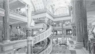  ?? Jim Wilson / New York Times ?? By Eric Lipton and Liz Moyer The Forum Shops at Caesars Palace in Las Vegas features stores from high-end retailers. Lobbyist added 54 words to a government spending bill that temporaril­y preserves a loophole allowing hotel, restaurant and gaming...