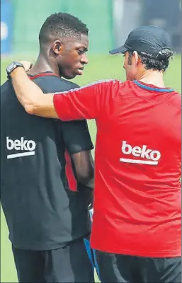  ??  ?? Dembélé y Valverde, en una imagen de archivo de un entrenamie­nto FOTO: FC BARCELONA