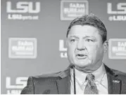  ?? Hilary Scheinuk / The Advocate via AP ?? LSU coach Ed Orgeron speaks during a news conference Saturday in Baton Rouge, La. Orgeron is from Larose, La.