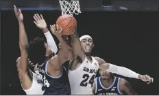  ?? ASSOCIATED PRESS ?? ARIZONA STATE’S JALEN GRAHAM (24), blocks a shot attempt by Villanova’s Jeremiah Robinson-Earl during a game Thursday in Uncasville, Conn.