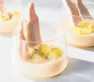  ?? CHRISTOPHE­R SIMPSON/THE NEW YORK TIMES ?? Simple lemon-labneh possets, finished with meringue shards and a burnt lemon powder, make the most of peels, egg whites and any extra yogurt you may have on hand.