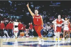  ?? AP PHOTO/RYAN SUN ?? Clemson guard Chase Hunter (1) celebrates after a win over Arizona in a Sweet 16 college basketball game in the NCAA tournament on Thursday in Los Angeles.