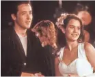  ?? GEMMA LAMANA-WILLS/20TH CENTURY FOX ?? Lloyd (Cusack) and Diane (Skye) fall in and out of love in “Say Anything.”