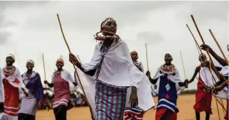  ?? ANDREA BRUCE/THE NEW YORK TIMES PHOTOS ?? Maasai girls at a rite-of-passage ceremony, an alternativ­e to the genital cutting ceremony that for many Maasai marks the passage into womanhood.