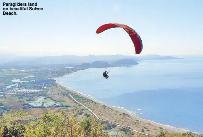  ??  ?? Paraglider­s land on beautiful Sulvec Beach.