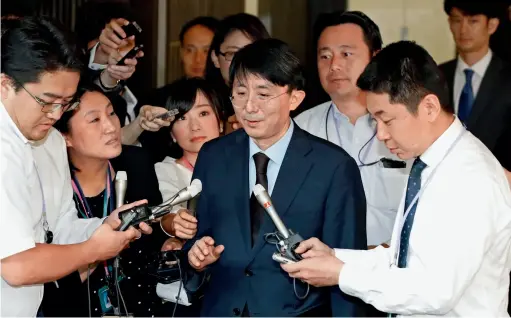  ??  ?? 当地时间 2019 年 9 月20日，在日本东京举行的日韩­司局级磋商吸引了各方­媒体关注