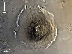  ??  ?? North 100km
The spread of landslide deposits around Mars’s biggest volcano suggests they may have been distribute­d by an ocean