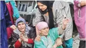  ??  ?? Relatives mourn the death of Congress leader Ghulam Nabi Patel who was killed in a militant attack in Pulwama district on Wednesday