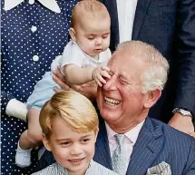  ??  ?? Hello Grandad: Brother George poses, but Louis doesn’t care about Charles’s 70th birthday photo