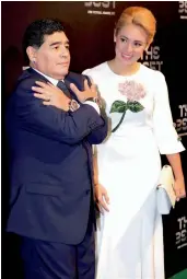  ?? — AP ?? Diego Armando Maradona (left) and his partner Rocio Olivia at Fifa 2017 awards event at the Palladium Theatre in London on Monday.