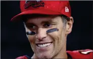  ?? AP FILE ?? Tampa Bay Buccaneers quarterbac­k Tom Brady (12) speaks with the media after defeating the Dallas Cowboys in Arlington, Texas, on Sept. 11.