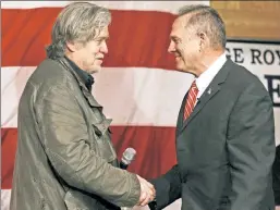  ??  ?? A revolting revolt: Bannon and Moore at a rally in Alabama on Tuesday.